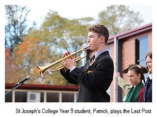 St Joseph's College Year 9 student, Patrick, plays the last post.