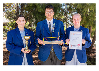 A team of students from St Monica’s College, Epping with their solar-powered boat.