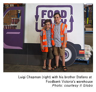 Luigi Chapman (right) with his brother Stefano at Foodbank Victoria's warehouse