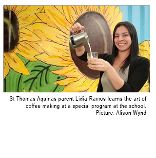 St Thomas Aquinas parent Lidia Ramos learns the art of coffee making at a special program at the school.