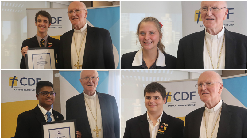 Image of the Archbishop and students receiving their awards