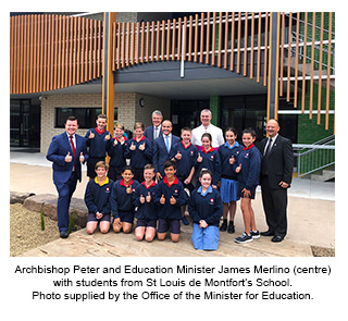 Archbishop Peter and Education Minister James Merlino (centre) with students from St Louis de Montfort’s School. Photo supplied by the Office of the Minister for Education.
