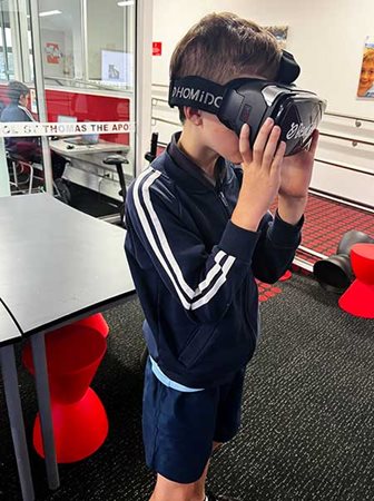 student wearing a virtual reality headset
